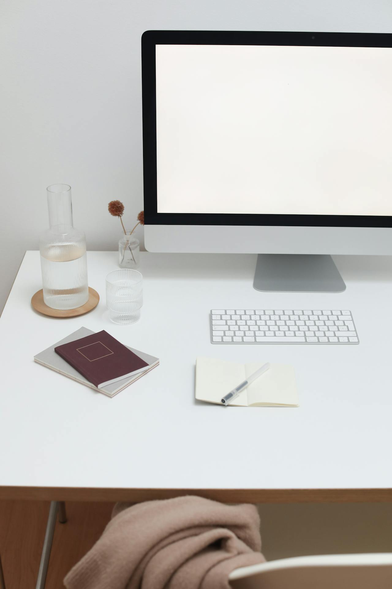 a computer for website design and optimization on a white desk